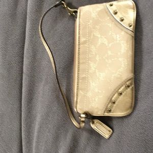 Coach gold wristlet